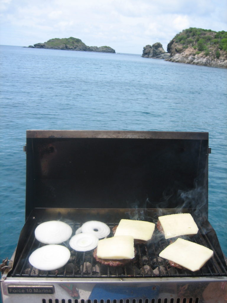 Grilling cheeseburgers on Garner Bay, Jost Van Dyke