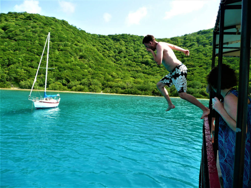 Busy Boater jumping into the ocean from the William Thorton (Willy T's) in the British Virgin Islands