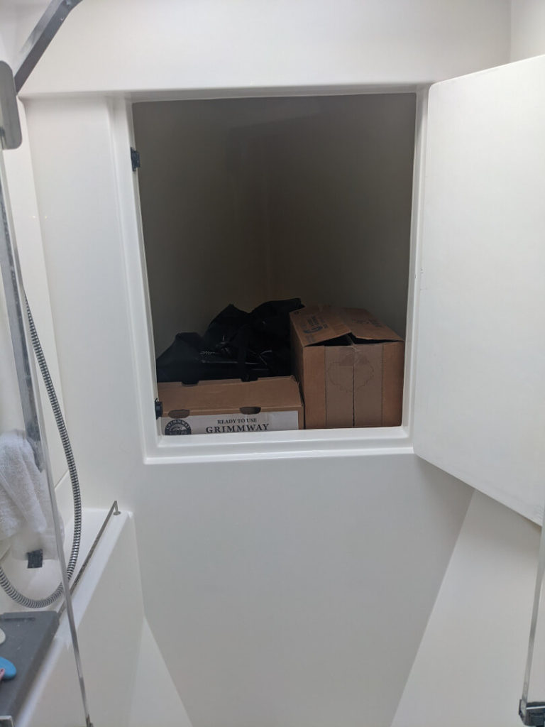 Leopard 433 PC forepeak storage in owner's shower stall