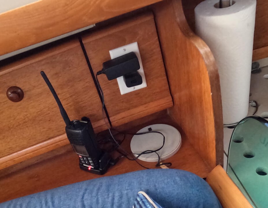 Handheld VHF radio charging on a 120 volt outlet